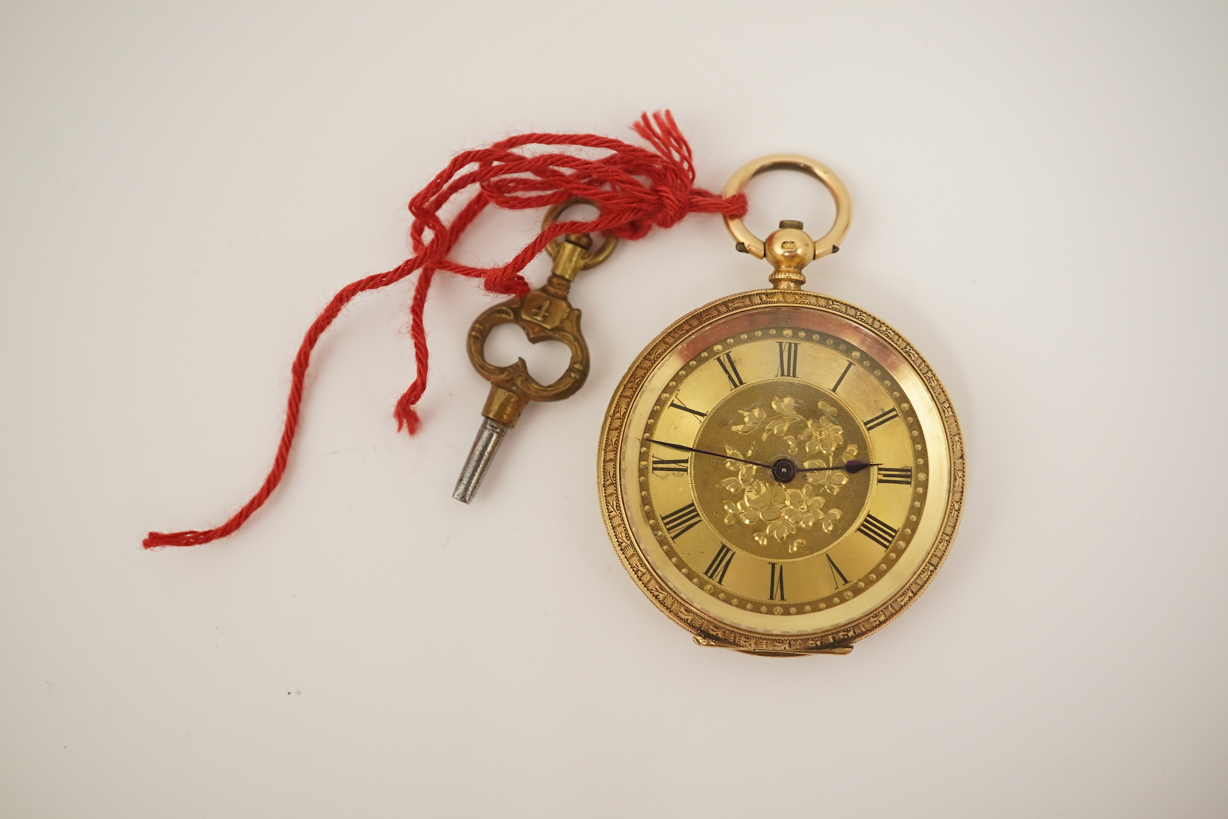 An early 20th century continental engraved 18k gold open faced fob watch